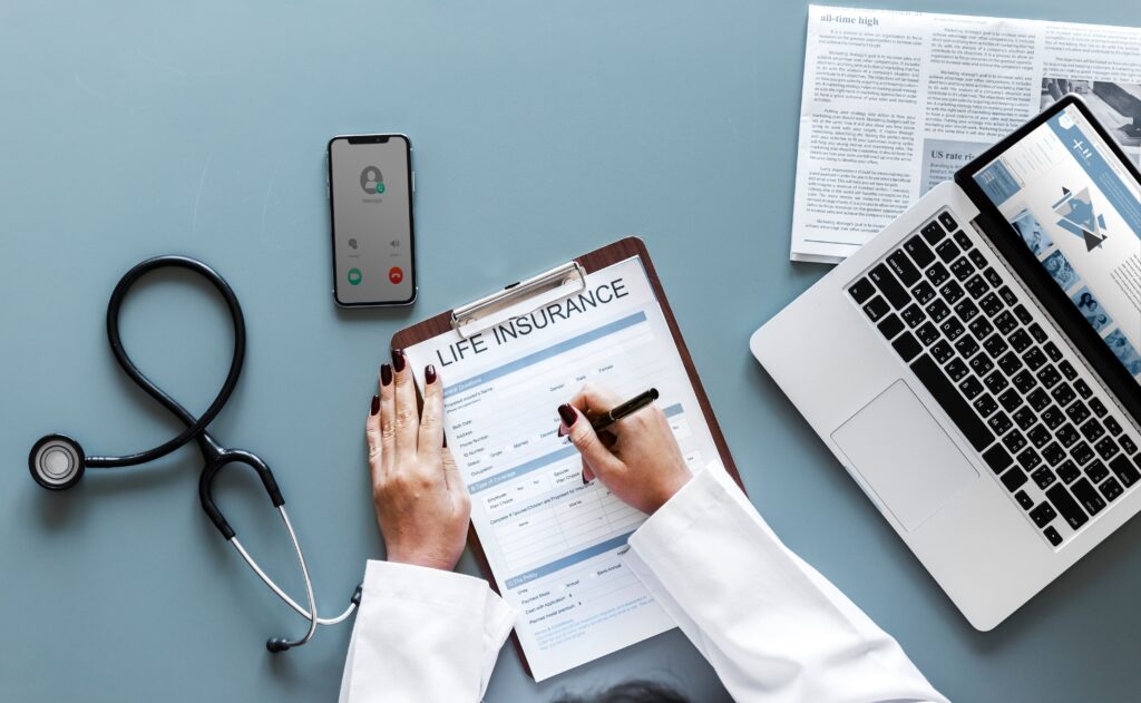 Therapist filling out insurance credentialing application

